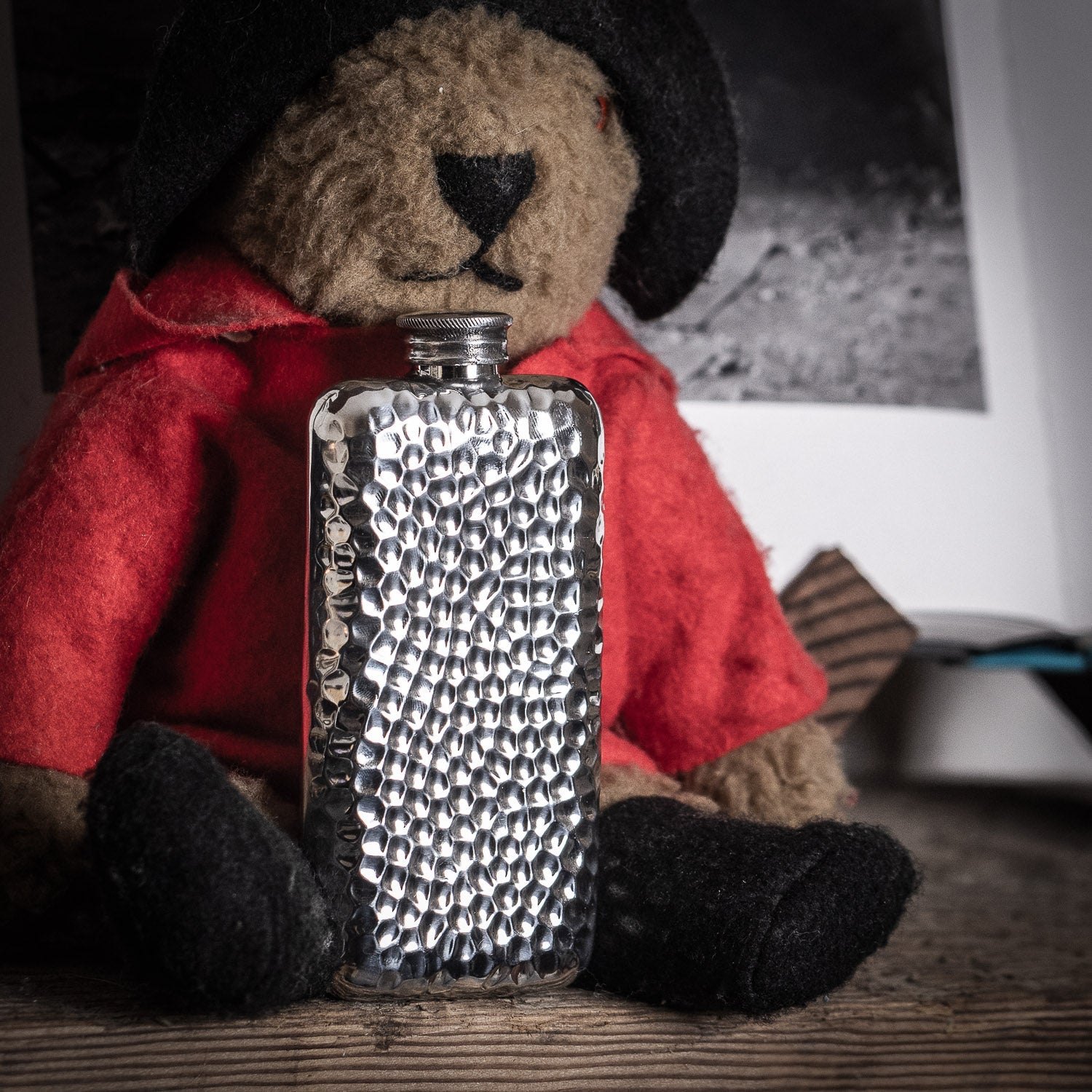 AR Wentworth hammered pewter flask next to a Paddington bear | Last Manner