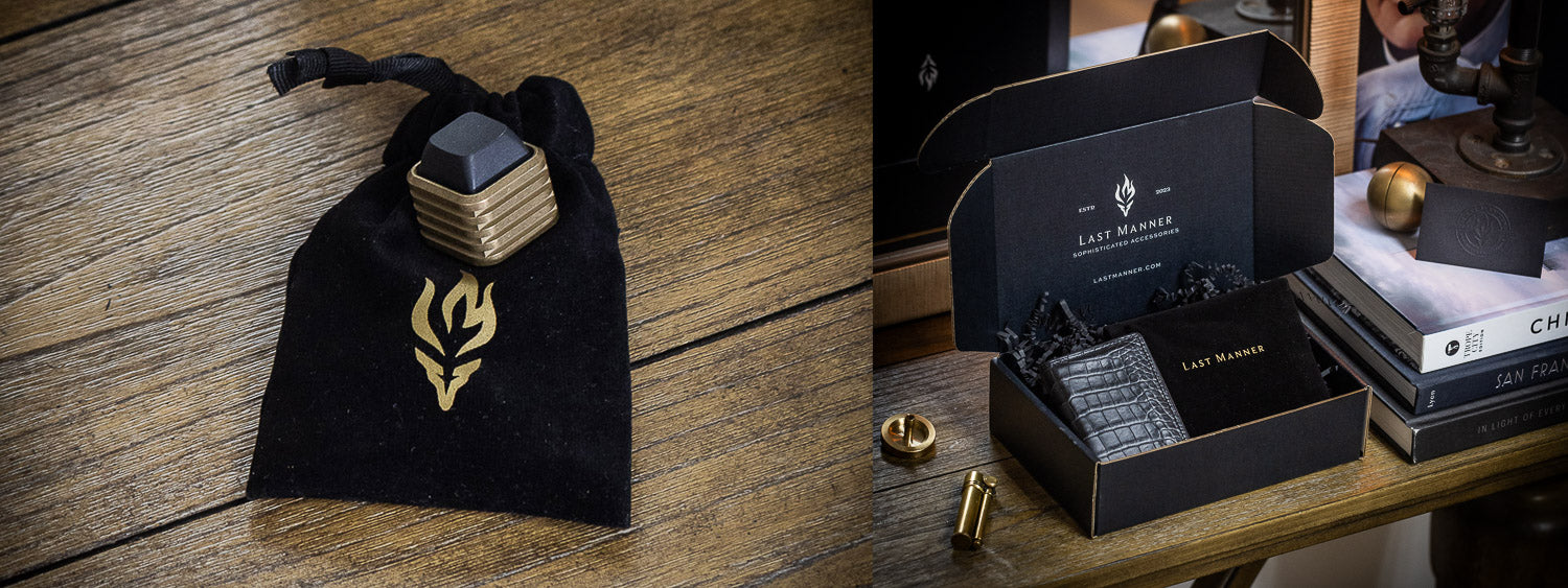 Last Manner torch emblem on a velvet bag next to a Last Manner box with black alligator wallet | Last Manner