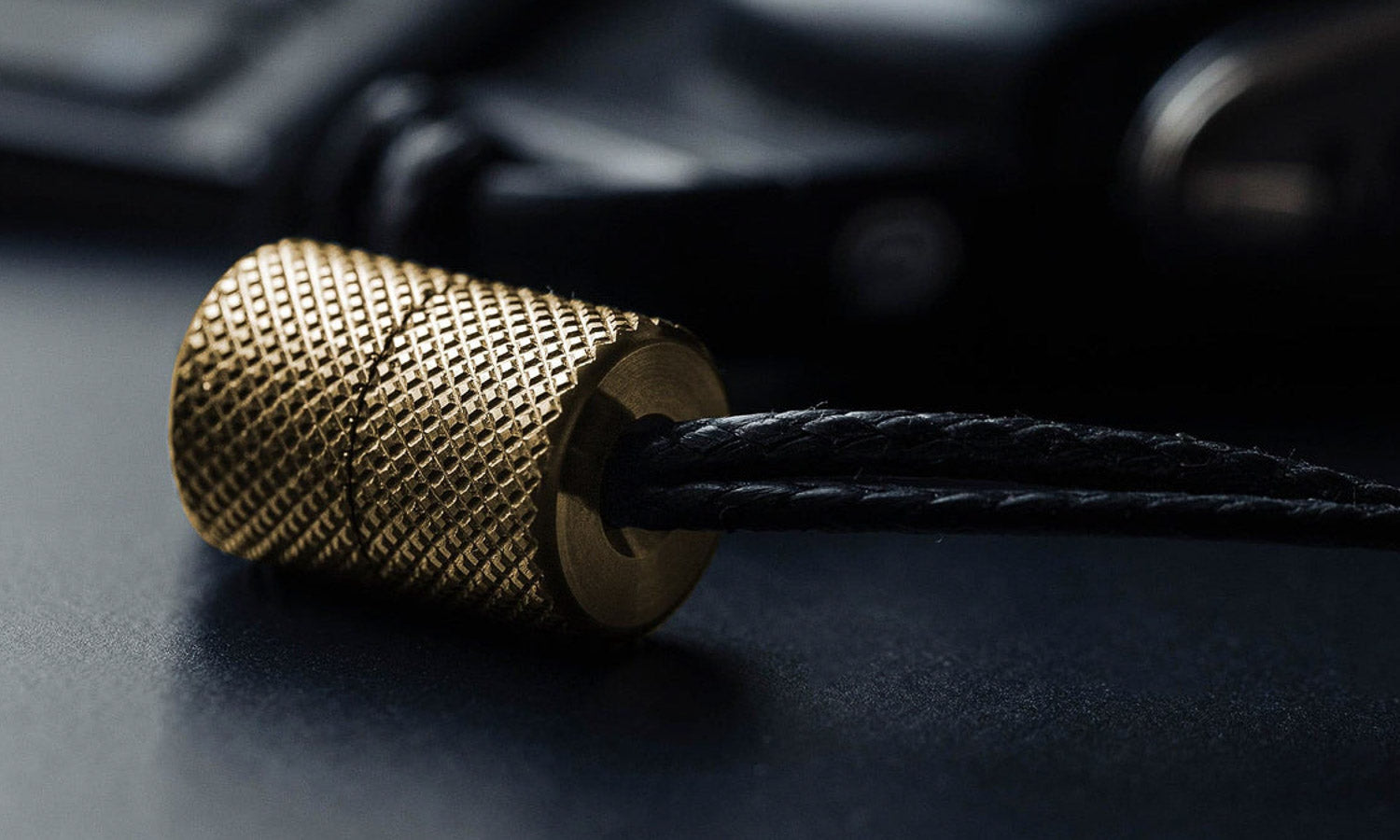 close up of knurling on wingback brass key loop keychain