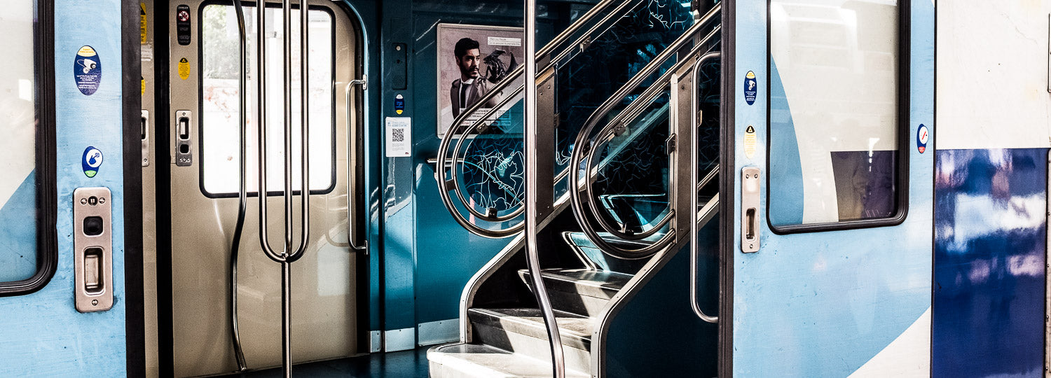 Close-up of a subway train door with reflective surface | Last Manner